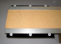 Rear view vertical panel with attached aluminum rails and rollers