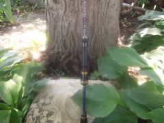 handle of a 2wt fly rod built into a ultralight spinning rod