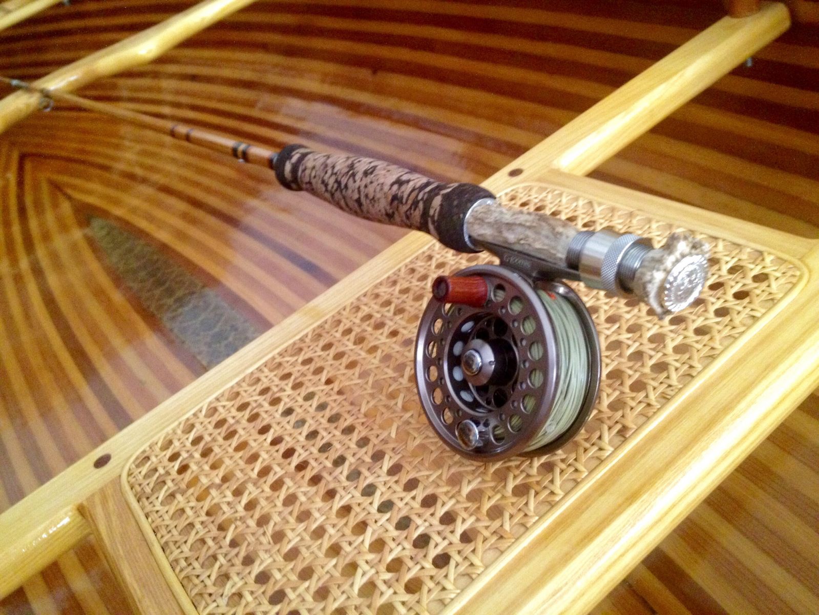 Bamboo fly rod with deer antler reel seat. - 2016 Mud Hole Calendar Contest  